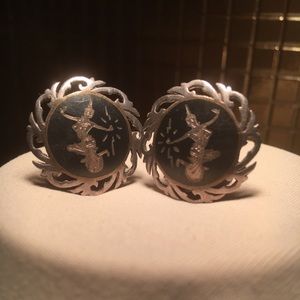 Vintage hand-carved sterling clip-on earrings